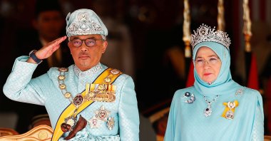 Malaysia's new King Sultan Abdullah Sultan Ahmad Shah (L) and Queen Tunku Azizah Aminah Maimunah Iskandariah attend a welcoming ceremony at the Parliament House in Kuala Lumpur, Malaysia, Jan. 31, 2019.