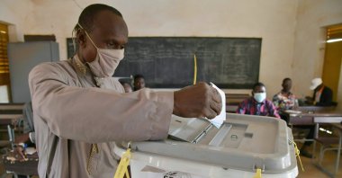 A man casts his ballot at a polling station in Niamey during Niger's presidential and legislative elections, Dec. 27, 2020. (AFP Photo)