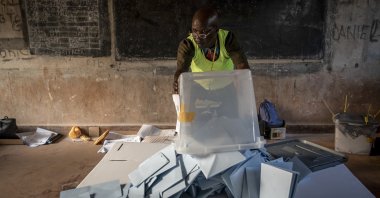 Electoral workers start to count votes at the Lycee Boganda polling station in the capital Bangui, Central African Republic Sunday, Dec. 27, 2020. (AP Photo)