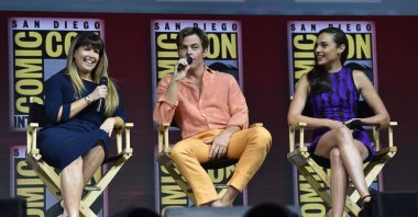 Director Patty Jenkins, and actors Chris Pine and Gal Gadot (L-R) participate in the Warner Bros. Theatrical Panel for "Wonder Woman 1984" during Comic Con in San Diego, July 21, 2018.  (AFP Photo)