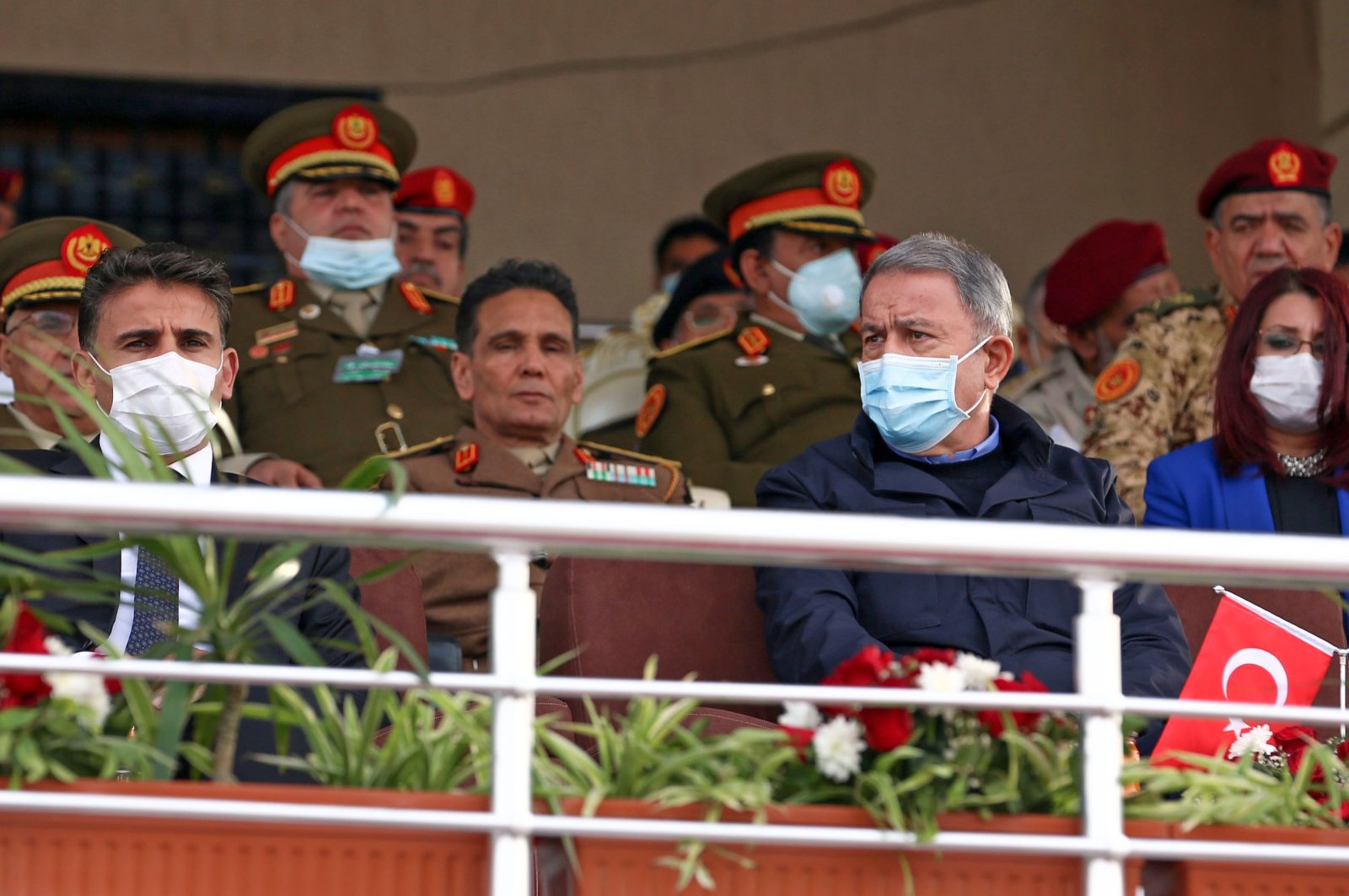 Turkish Minister of Defence Hulusi Akar (R) and his Libyan counterpart Salahaddin Namroush (L) attend a graduation ceremony for new batches of students from the Military College in the Libyan capital Tripoli, Libya, Dec. 26, 2020. (AFP Photo)