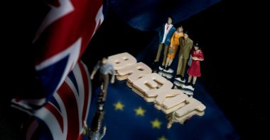 This picture shows the flags of the U.K. and the European Union and figurines next to the word "Brexit," Brussels, Belgium, Jan. 5, 2020. (AFP Photo)