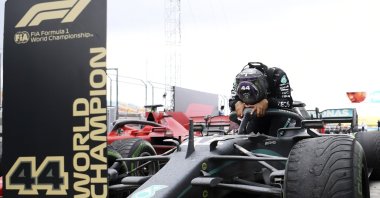 Mercedes driver Lewis Hamilton reacts after winning the Turkish Formula One Grand Prix at the Istanbul Park circuit, in Istanbul, Turkey, Nov. 15, 2020. (AP Photo)