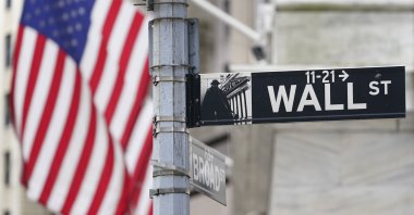A street sign is displayed at the New York Stock Exchange in New York, U.S. Nov. 23, 2020 (AP Photo)