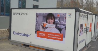 A container filled with vaccines at a Sinovac facility with a message in Turkish reading "Smile without masks, get rid of the distance," in Beijing, China, Dec. 29, 2020. (DHA PHOTO)