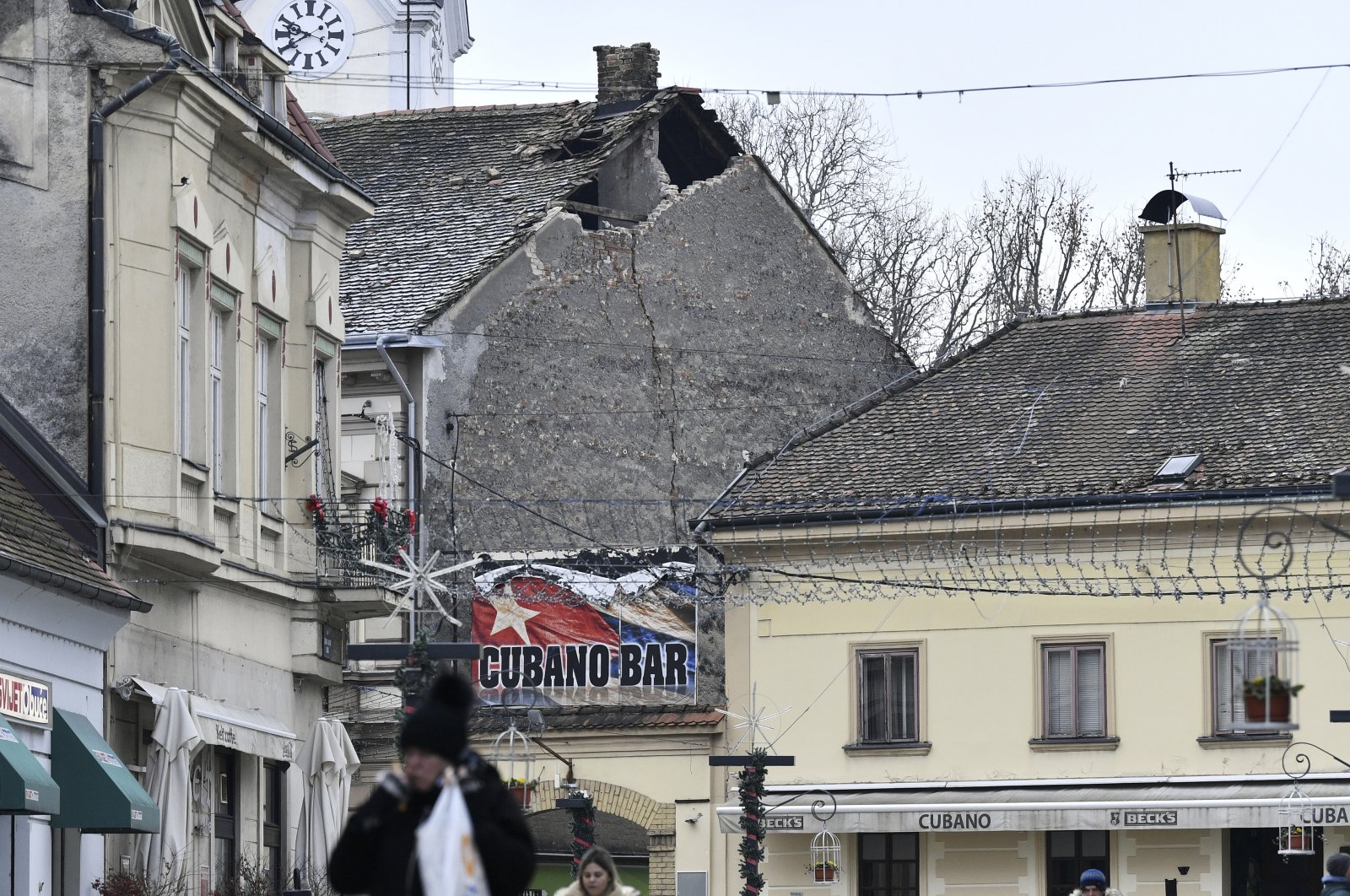 A view of a damaged roof caused by an earthquake in Sisak, Croatia, Dec. 28, 2020. (AP Photo)