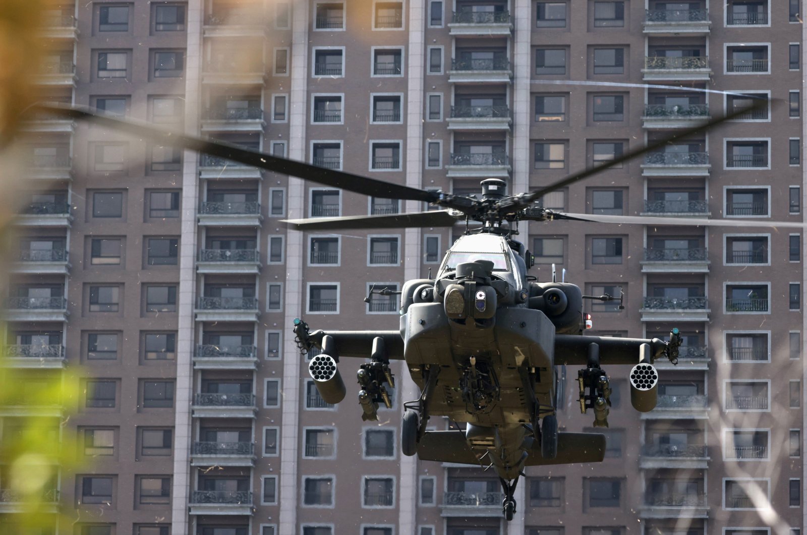 An AH-64E Apache attack helicopter lands during "Combat Readiness Week" drills in Hsinchu, Taiwan, Oct. 29, 2020. (Reuters File Photo)