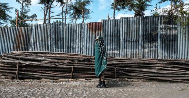 A member of the Amhara Special Forces, covered with a traditional blanket, stands in a street in the town of Korem, north of Alamata, Ethiopia, Dec. 12, 2020. (AFP Photo)
