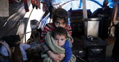 Internally displaced children who fled from the western Aleppo countryside sit inside a tent in Afrin, northwestern Syria, Feb. 14, 2020. (Reuters Photo)