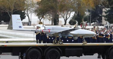 An Azerbaijan army Bayraktar TB2, a medium-altitude, long-endurance unmanned combat aerial vehicle, is displayed during a military parade to mark the victory in the Nagorno-Karabakh conflict, in Baku, Azerbaijan, Dec. 10, 2020. (Turkish Presidential Press Office / Handout via Reuters)