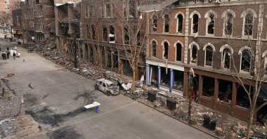 Debris remains on the sidewalks in front of buildings damaged in a Christmas Day explosion in Nashville, Tennessee, U.S., Dec. 29, 2020. (AP Photo)