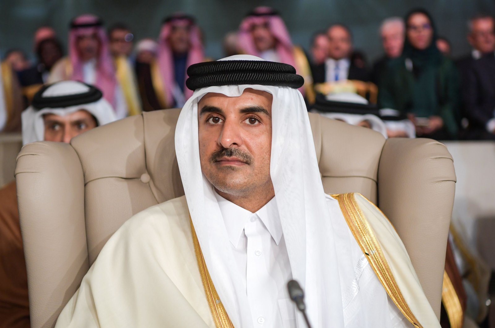Qatar's Emir Sheikh Tamim bin Hamad Al Thani attends the opening session of the 30th Arab League summit in the Tunisian capital Tunis, March 31, 2019. (AFP Photo)