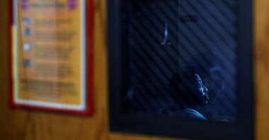 Bruce Shackleford, a COVID-19 positive patient, sits in his isolation room at Roseland Community Hospital on the South Side of Chicago, Illinois, U.S., Dec. 8, 2020. (REUTERS Photo)