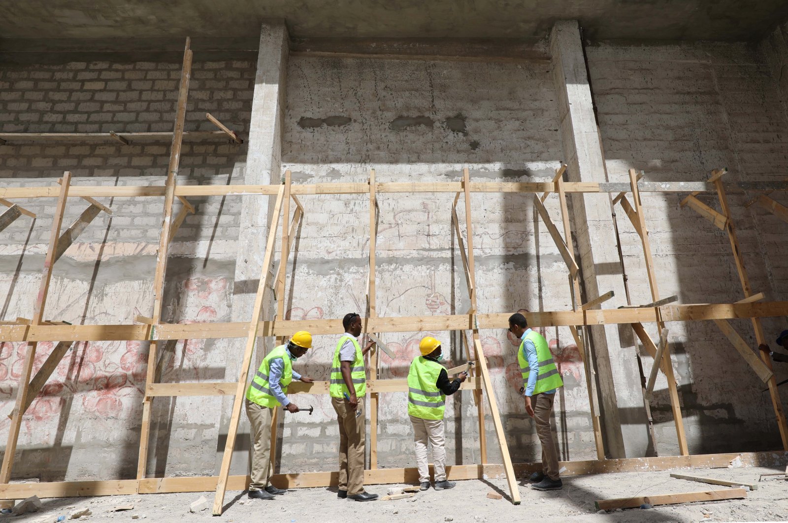 Construction workers take part in the renovation project of Somalia's National Theatre in Mogadishu, Somalia Feb. 3, 2019. (Reuters File Photo)