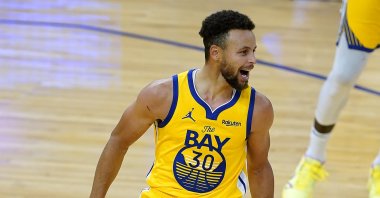 Golden State Warriors' Stephen Curry reacts after scoring during an NBA game against the Portland Trail Blazers, in San Francisco, California, U.S., Jan. 3, 2021. (AP Photo)
