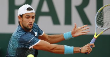 Matteo Berrettini plays a shot against Lloyd Harris during a French Open match at the Roland Garros stadium in Paris, France, Oct. 1, 2020. (AP Photo)