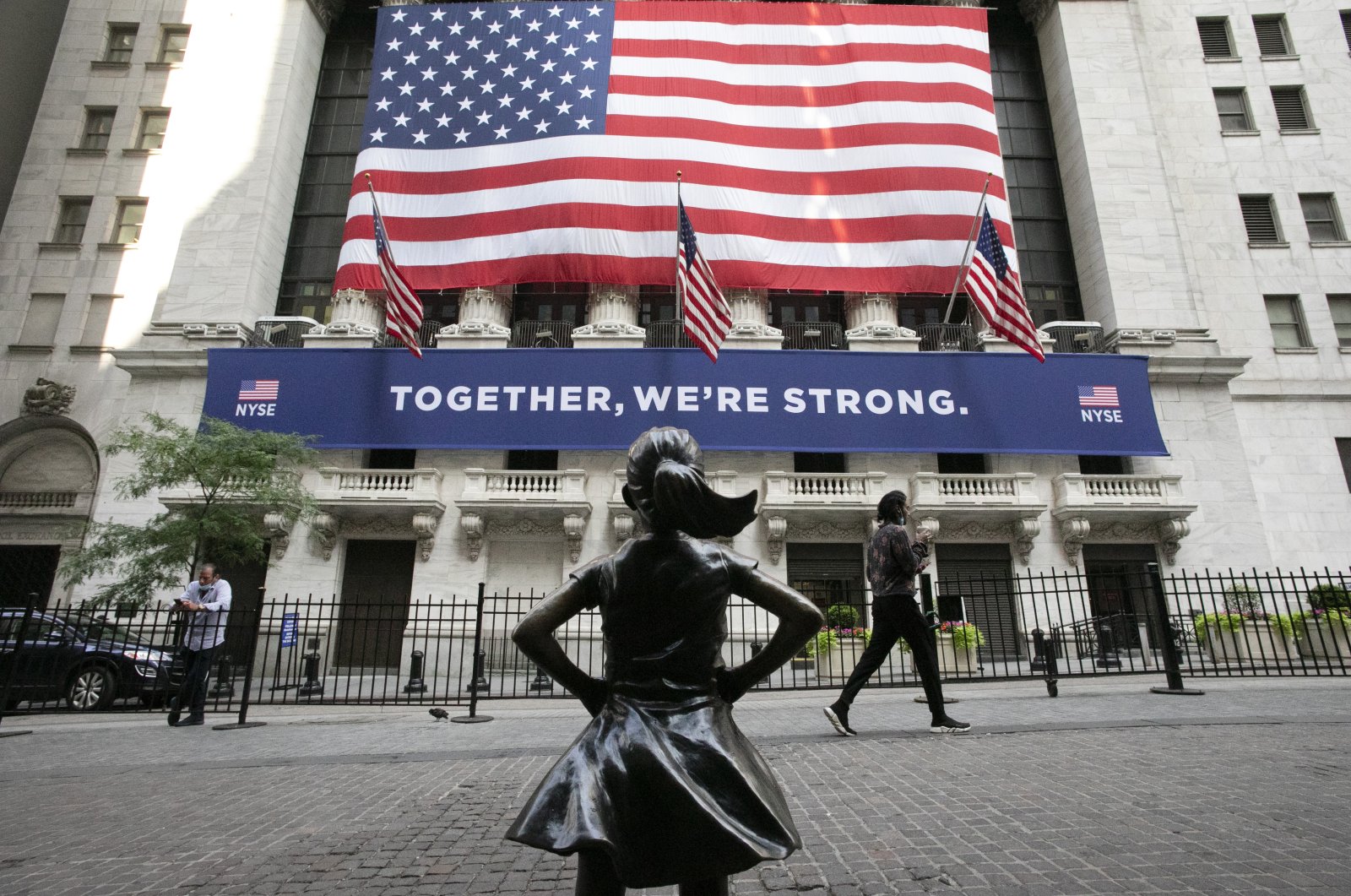 In this July 9, 2020 file photo, the Fearless Girl statue stands in front of the New York Stock Exchange in New York. (AP Photo)