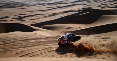 Nasser Al-Attiyah and his co-driver Mathieu Baumel compete during Stage 2, in Wadi ad-Dawasir, Saudi Arabia, on Jan. 4, 2021. (AFP PHOTO)