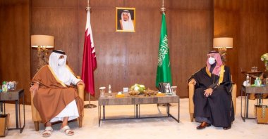Saudi Arabia's Crown Prince Mohammed bin Salman meets Qatar's Emir Sheikh Tamim bin Hamad al-Thani during the Gulf Cooperation Council's (GCC) 41st Summit in Al-Ula, Saudi Arabia January 5, 2021. (Bandar Algaloud / Courtesy of Saudi Royal Court / Handout via Reuters)
