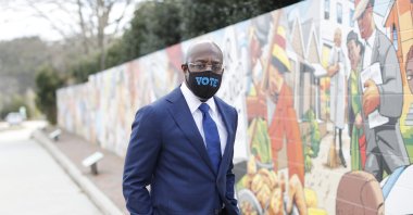 Democratic Senate candidate Rev. Raphael Warnock views the Elizabeth Porter Park mural showing the history of Marietta during a canvassing event in Marietta, Georgia, U.S., Jan. 4, 2021. (EPA-EFE Photo)