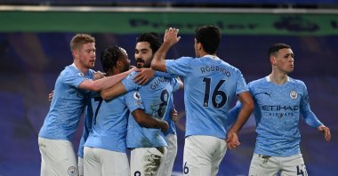 Manchester City players celebrate a goal during a Premier League match against Chelsea at the Stamford Bridge, in London, Jan. 3, 2021. (AFP Photo)