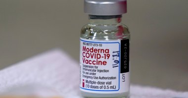 In this file photo, a bottle of the Moderna COVID-19 vaccine is pictured on a table before being utilized in Topeka, U.S. on Dec. 30, 2020. (AP Photo)