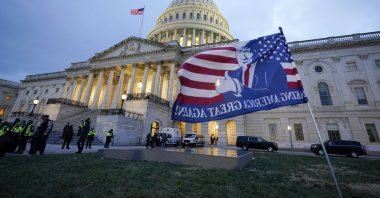 Trump supporters left a flag outside the Capitol, Wednesday evening, Jan. 6, 2021, in Washington. (AP Photo)