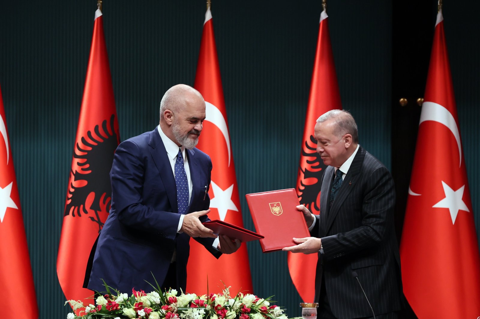 Albanian Prime Minister Edi Rama (L) and President Recep Tayyip Erdoğan sign a cooperation deal in the capital Ankara, Turkey, Jan. 6, 2020. (AA Photo)