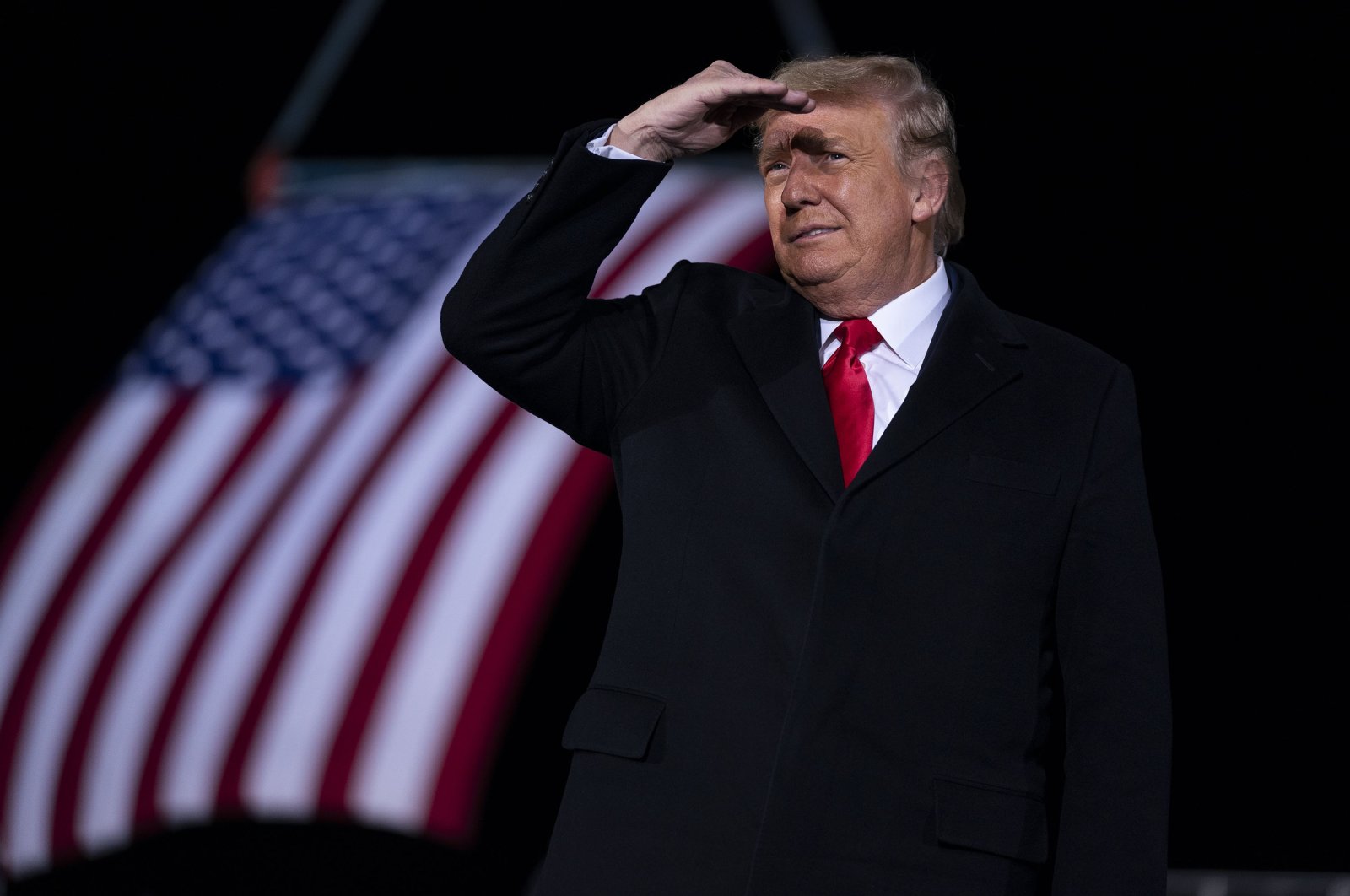 President Donald Trump arrives to speak at a campaign rally in Dalton, Ga. Jan. 4, 2021. (AP Photo)
