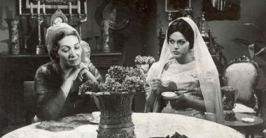 Cahide Sonku (L) with actress Türkan Şoray in a scene from "El Kızı" ("The Stranger's Daughter").