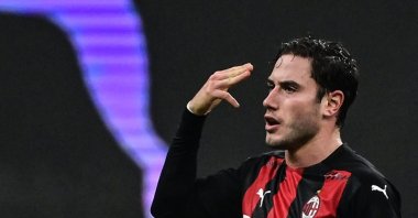 AC Milan's Davide Calabria celebrates a goal during a Serie A match against Juventus at the Giuseppe Meazza stadium, in Milan, Italy, Jan. 6, 2021. (AFP Photo)