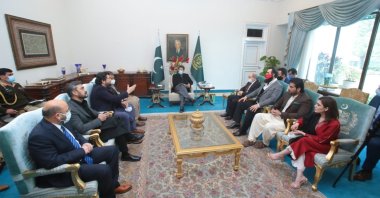 Prime Minister Imran Khan (C) together with the board headed by Turkish director Kemal Tekden at his office in Islamabad, Pakistan, Jan. 8, 2020. (AA Photo)