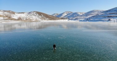 Gökçedere Dam Lake, frozen during the winter, offers a fascinating, picturesque landscape, Bayburt, northeastern Turkey, Jan. 6, 2021. (AA Photo)