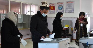 People vote during Kyrgyzstan's presidential election and a referendum on the government's system in the village of Koy-Tash outside Bishkek, Jan. 10, 2021. (AFP Photo)