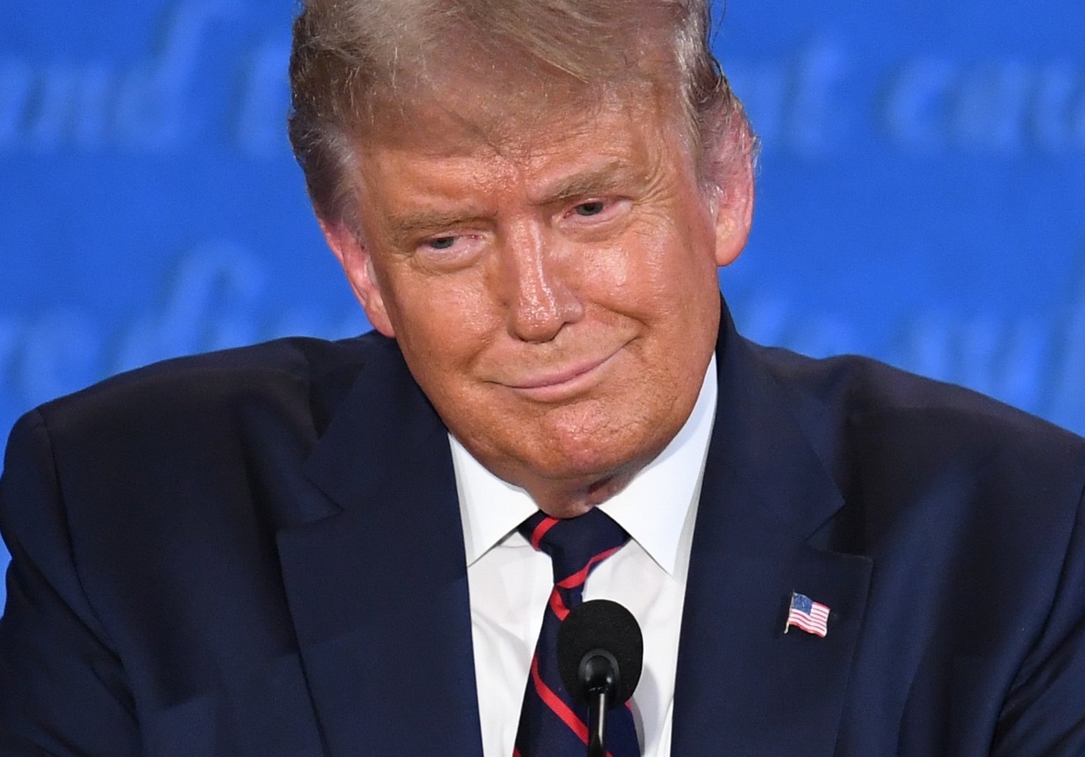 U.S. President Donald Trump smiles during the first presidential debate at Case Western Reserve University and Cleveland Clinic in Cleveland, Ohio, Sept. 29, 2020. (AFP)