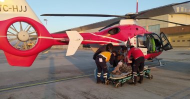 A patient is being carried to an ambulance helicopter in Van, eastern Turkey, Jan. 6, 2021. (İHA PHOTO)