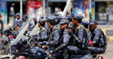 Members of a special security force loyal to the Houthi rebels ride on motorbikes following a military parade at Tahrir Square in downtown Sanaa, Yemen, July 19, 2017. (Reuters Photo)