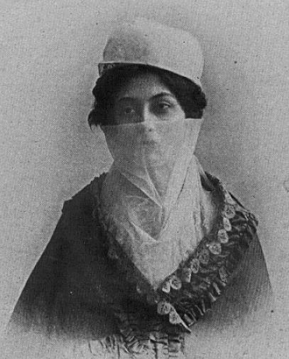An early photo of Halide Edib Adıvar, wearing a yashmak, a Turkish type of veil.