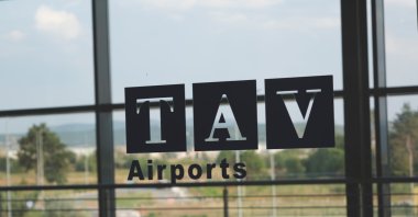 TAV Airports logo on an airport window in Skopje, Macedonia, Aug. 10, 2019. (Shutterstock Photo)
