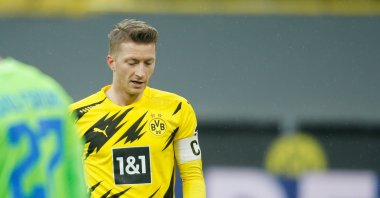 Borussia Dortmund's German forward Marco Reus reacts after failing to score during the German first division Bundesliga football match between Borussia Dortmund and VfL Wolfsburg, in Dortmund, Germany, Jan. 3, 2021. (Pool via AFP)