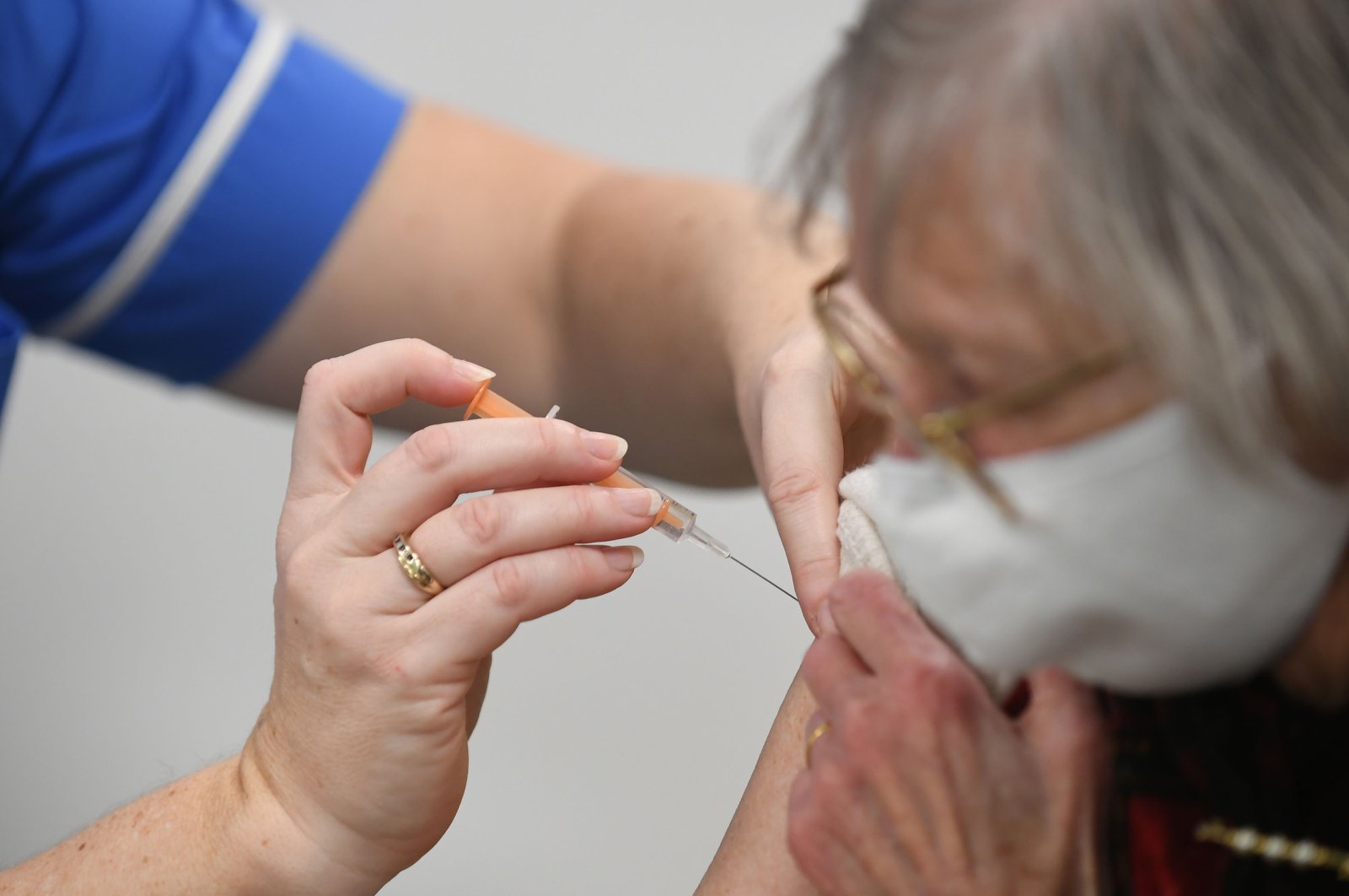 Heather Gallagher, 93, receives an injection of a COVID-19 vaccine at the National Health Service (NHS) vaccine center at Robertson House, Stevenage, England, Jan. 11, 2021. (Getty Images)