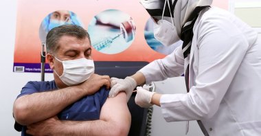 Turkey's Health Minister Fahrettin Koca receives a dose of Sinovac's COVID-19 vaccine at Ankara City Hospital, in Ankara, Turkey, Jan. 13, 2021. (AFP Photo)
