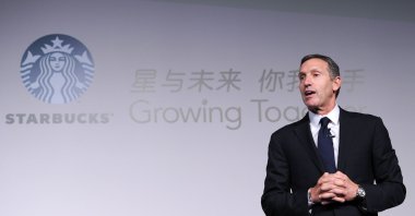 Howard Schultz, president and chief executive officer of Starbucks, delivers a speech at the Starbucks Partner Family Forum in Beijing, China, April 18, 2012. (AFP Photo)