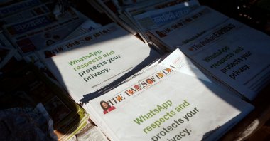 A WhatsApp advertisement is seen on the front pages of newspapers at a stall in Mumbai, India, Jan. 13, 2021. (Reuters Photo)
