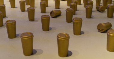 Fırat Engin, "Invasion," 2011, installation, polyester coffee cups, acrylic. 