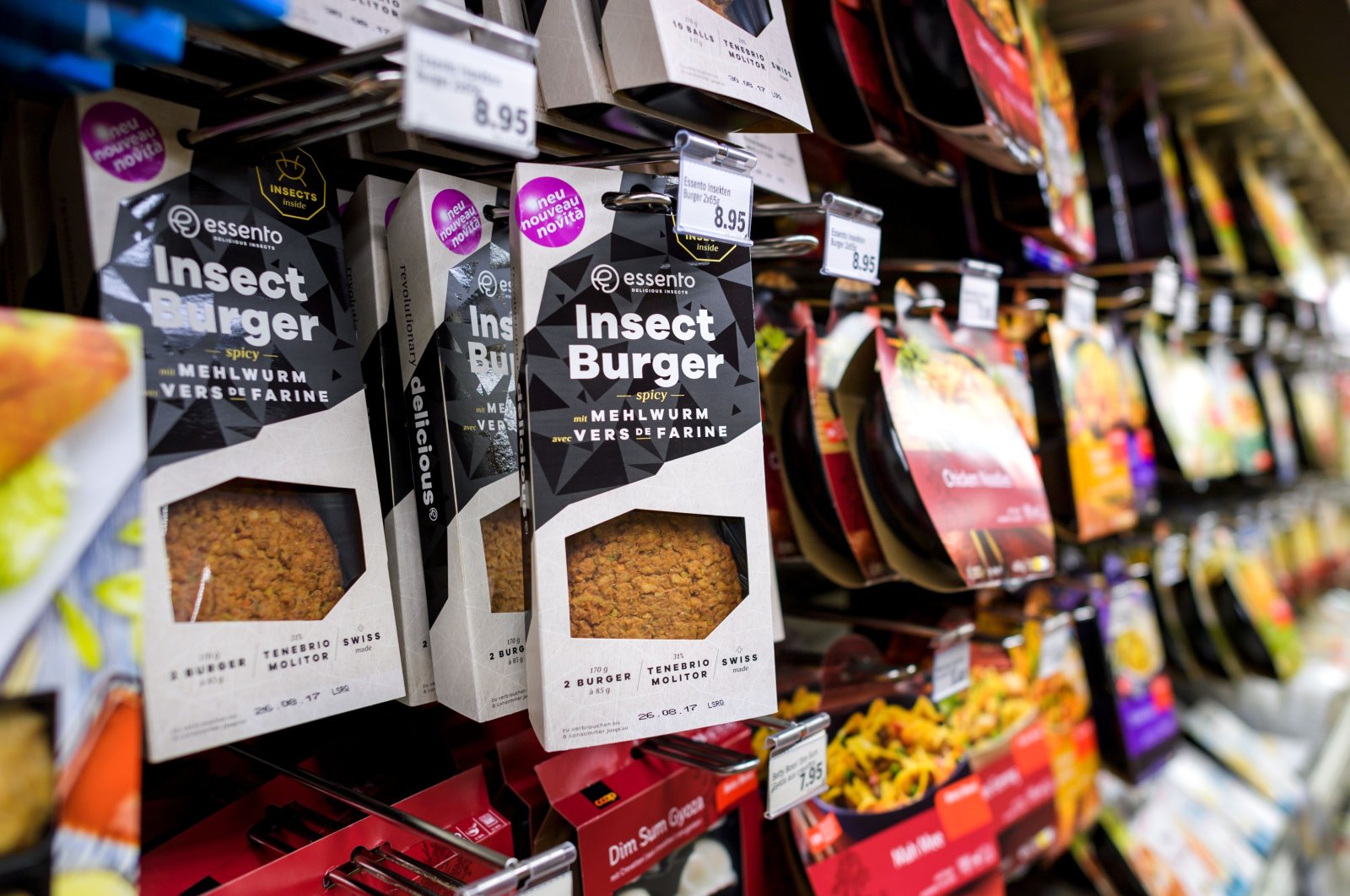 In this file photo taken on Aug. 21, 2017, packs of precooked insect burgers based on protein-rich mealworm are seen on a supermarket shelf in Geneva, Switzerland. (AFP Photo)