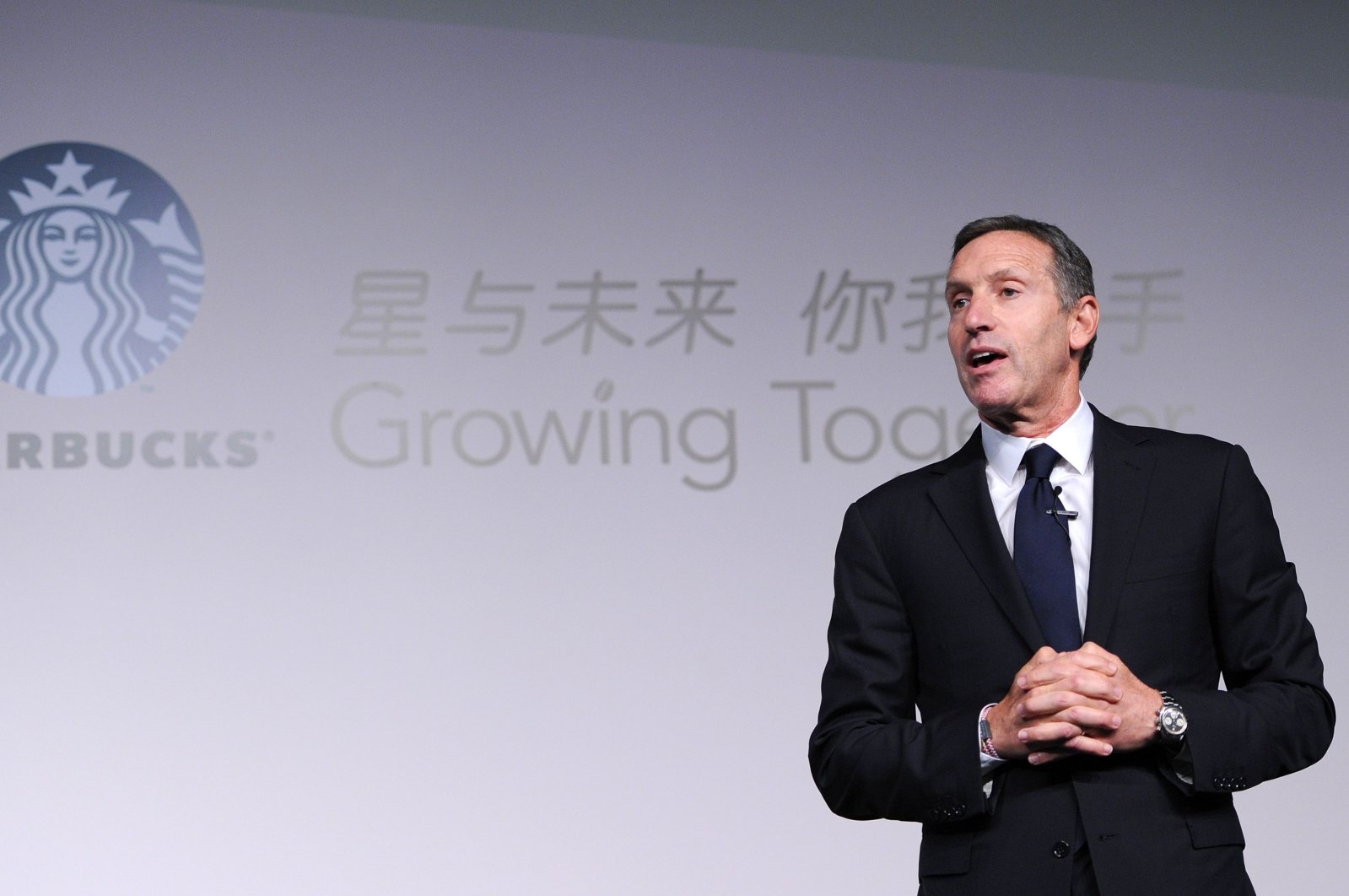 Howard Schultz, president and chief executive officer of Starbucks, delivers a speech at the Starbucks Partner Family Forum in Beijing, China, April 18, 2012. (AFP Photo)
