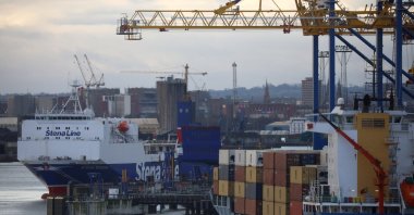 A Stena Line Irish Sea ferry is berthed next to a container ship at the Port of Belfast, Northern Ireland, Jan. 2, 2021. (Reuters Photo)