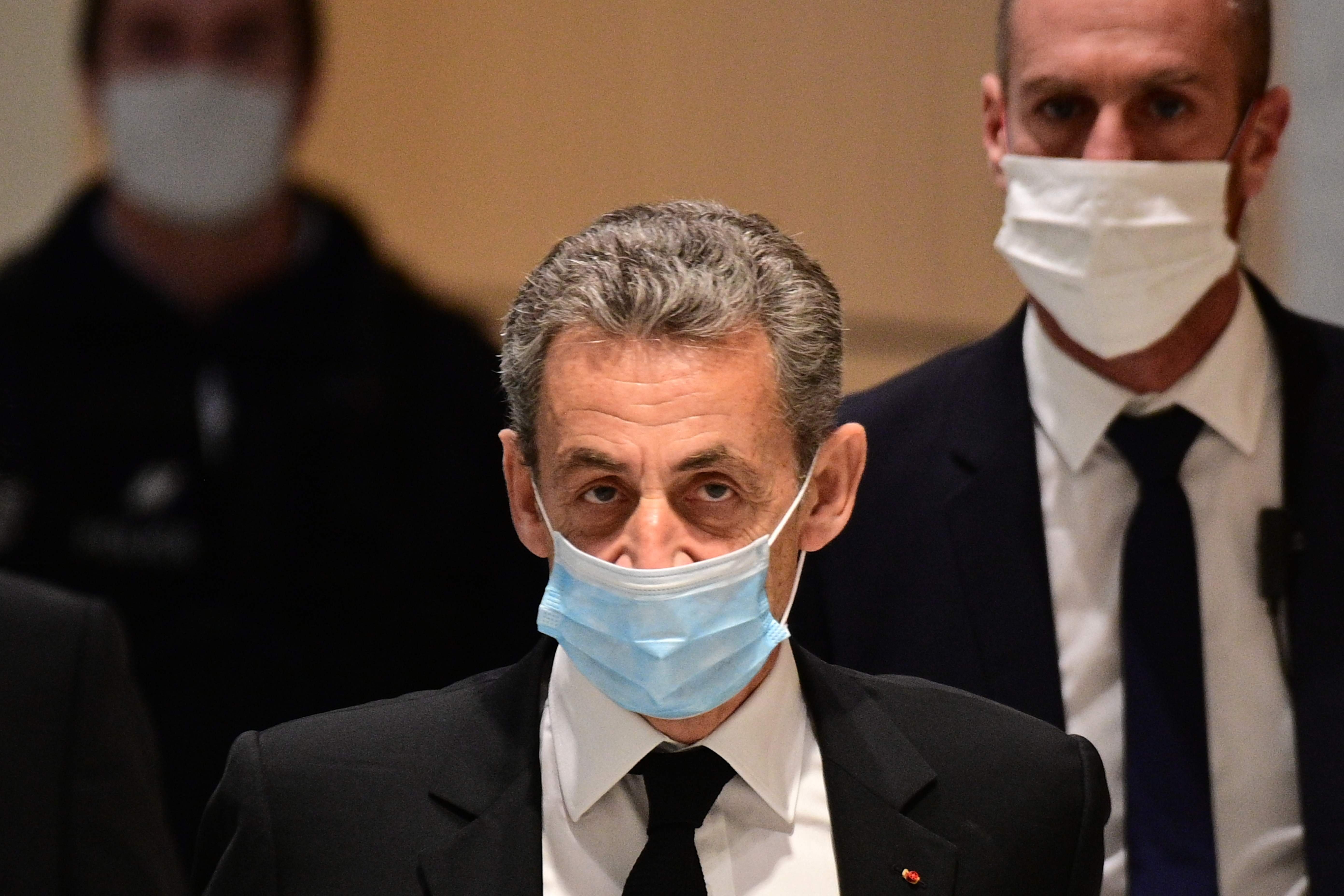 Former French president Nicolas Sarkozy (C) arrives for a hearing of his trial on corruption charges at Paris' courthouse, Paris, Dec. 7, 2020.

The French Financial Prosecution Office (PNF) has opened a preliminary investigation for "influence peddling" targeting Nicolas Sarkozy's consulting activities in Russia, corroborating what sources said on Jan. 15, 2021, confirming information from online newspaper Mediapart. (Photo by MARTIN BUREAU / AFP)