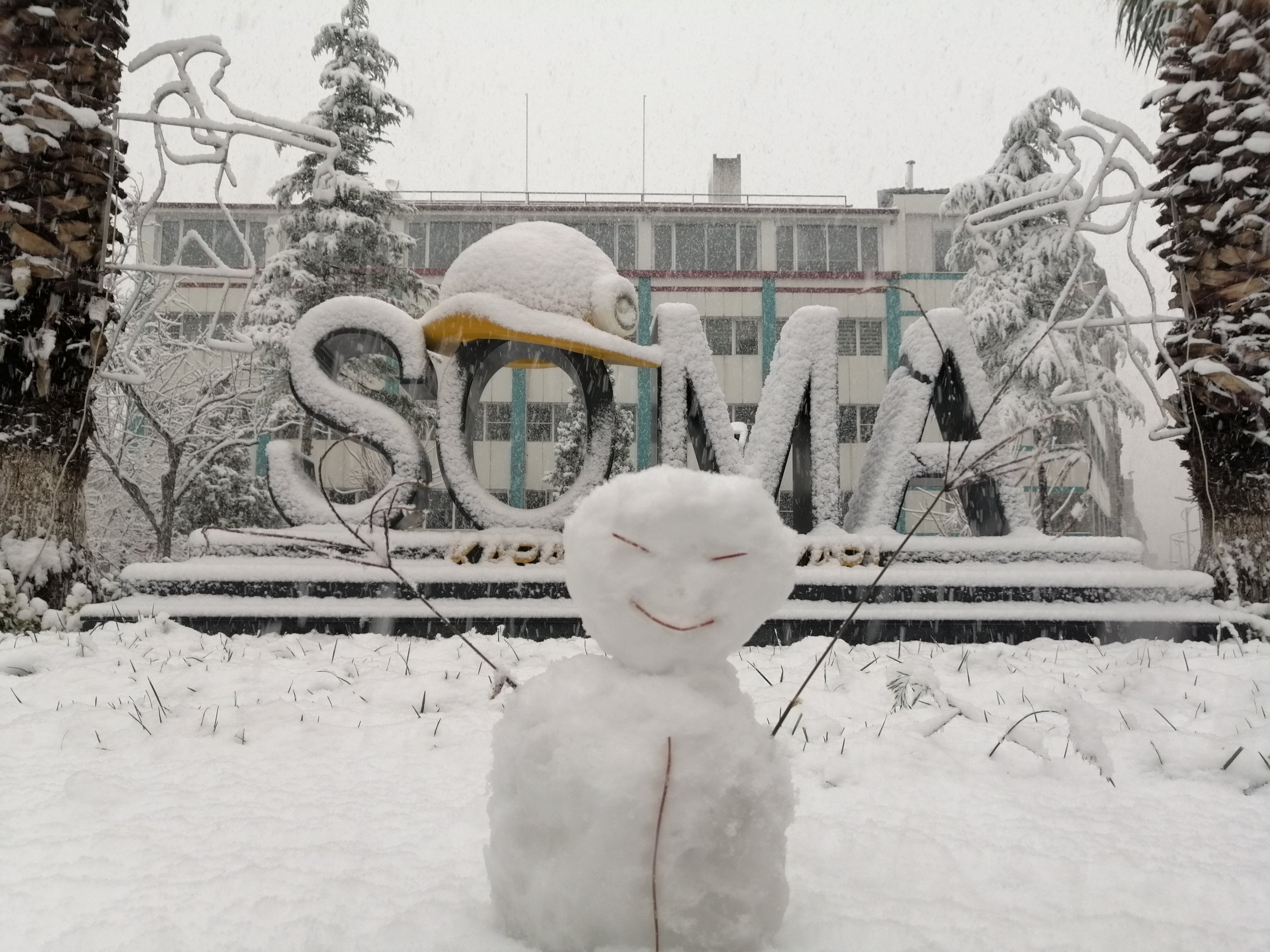 A snowman is seen in front of a landmark in the town Soma, in Manisa, western Turkey, on Jan. 16, 2021. (IHA Photo)